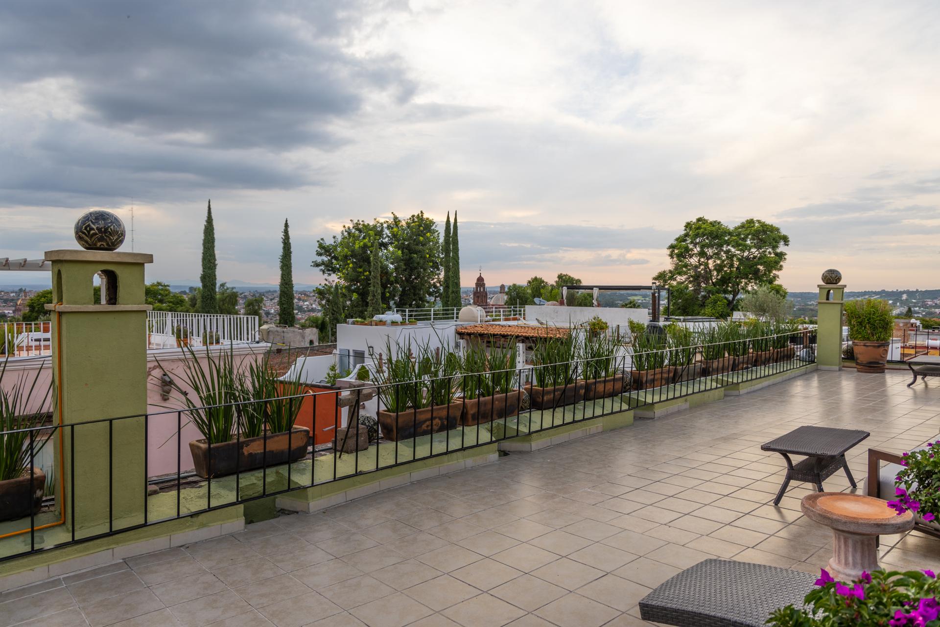 Rooftop terrace at Casa Schuck set up for an intimate wedding reception in San Miguel de Allende