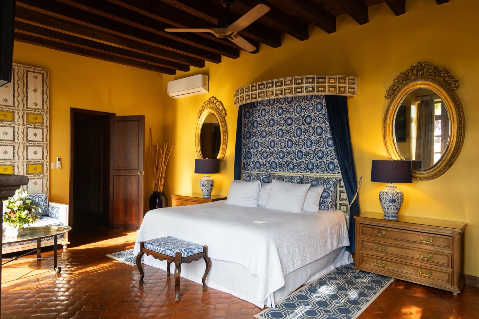 Hand-painted ceramic tiles and carved stone details at Casa Schuck